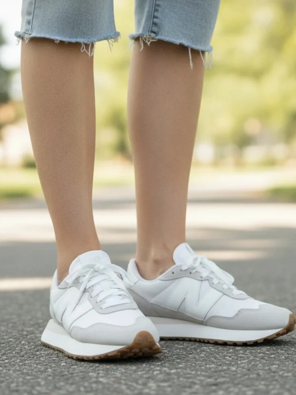 New Balance Women’s 237 Sneakers in White/Grey. Size 8